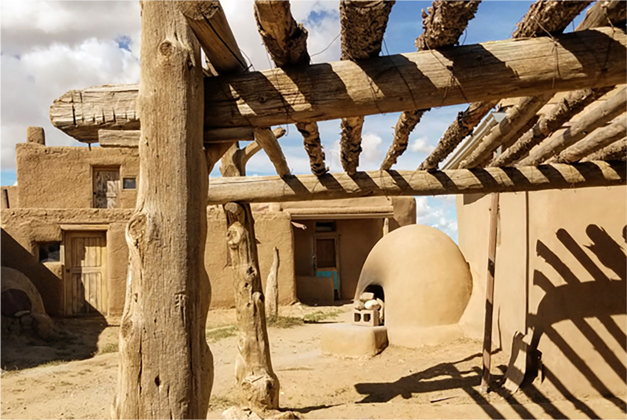 Horno and drying rack in Taos Pueblo, New Mexico.